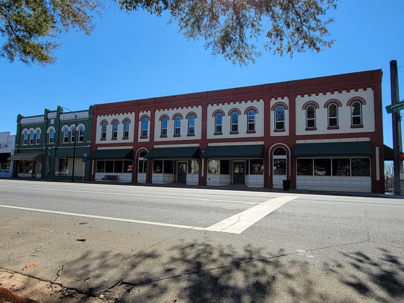 commercial storefront repaint, historic brick building, Tallahassee
