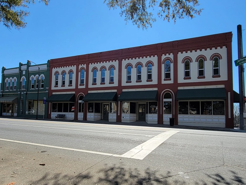 commercial exterior painting by Superior Painting, brick storefront block